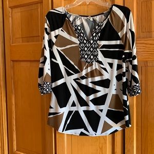 Adorable, easy to wear multicolor top.  Womens size medium, black brown & white.
